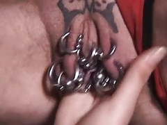 NastyAdult.info presents: Pierced granny with lots of genital piercings fisted