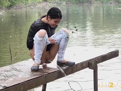 NastyAdult.info presents: Public pissing girl in jeans goes in two places