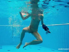 NastyAdult.info presents: Teen strips off her dress as she goes for a swim