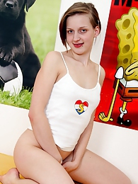 NastyAdult.info presents: A handsome teenage babe pleasures her moist and bald cunt