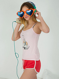 NastyAdult.info presents: This doll really knows how to have fun with her and how she can show off her pussy and listen to some beats at the same time.